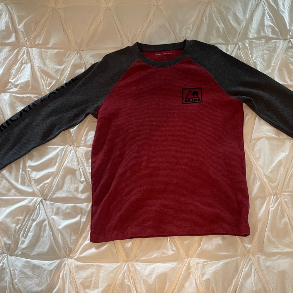 Maroon with dark gray sleeves